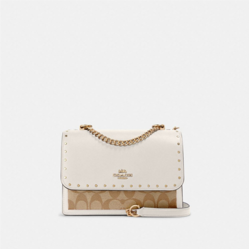 COACH Klare Crossbody Bag In Signature Canvas With Rivets