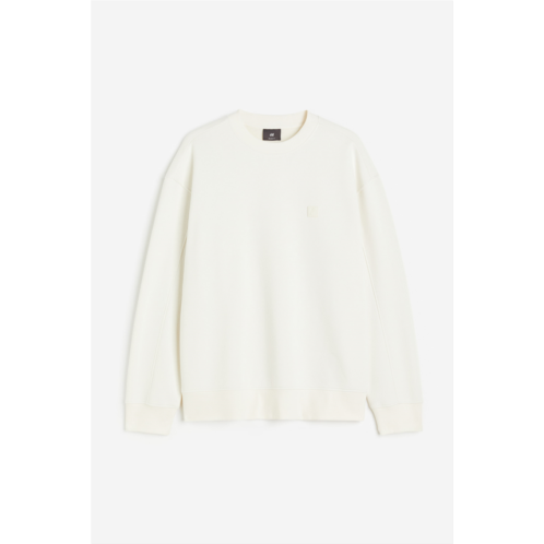 H&M Relaxed Fit Appliqued Sweatshirt