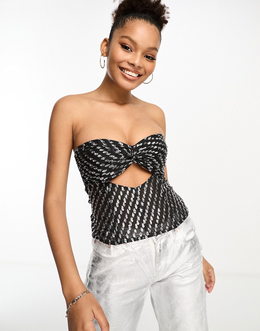 ASOS DESIGN boned corset with cut-out in dot jacquard