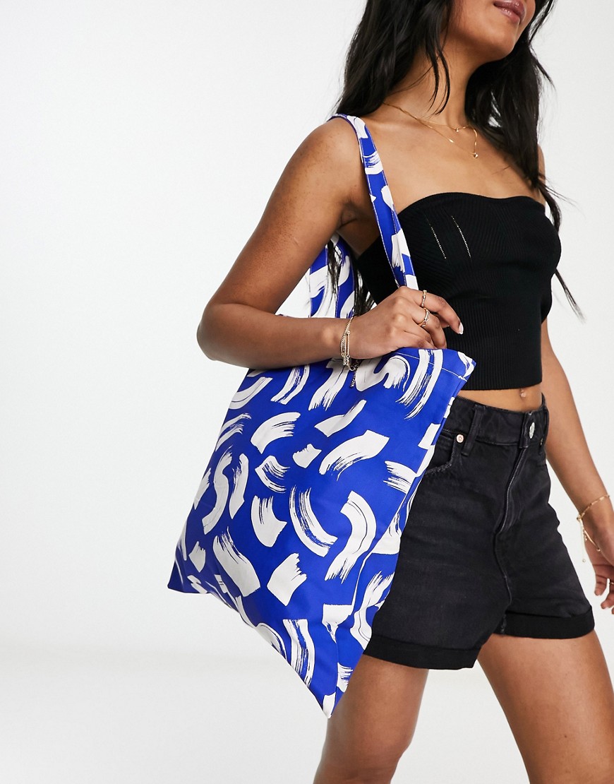 Monki swoosh print tote bag in blue and white