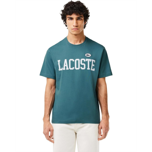 Mens Lacoste Short Sleeve Classic Fit Tee Shirt w/ Large Lacoste Wording
