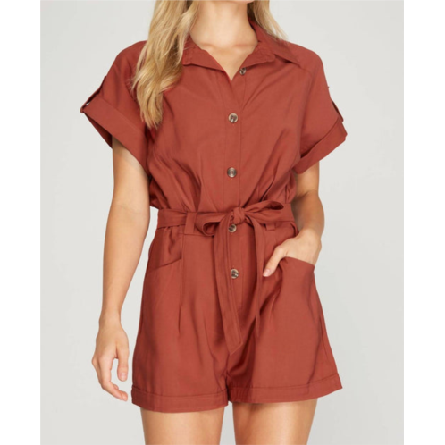 SHE + SKY drop shoulder woven twill romper with pockets in rust