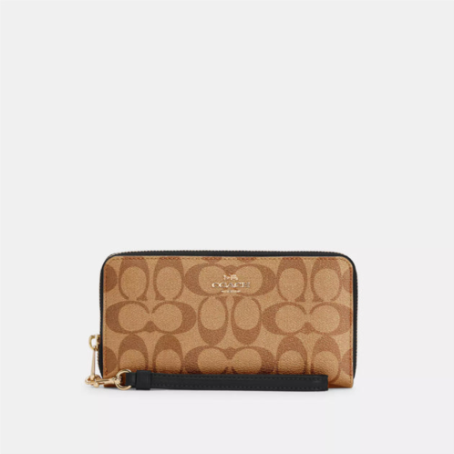 Coach Outlet long zip around wallet in signature canvas