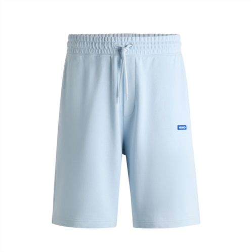 HUGO cotton-terry shorts with blue logo patch