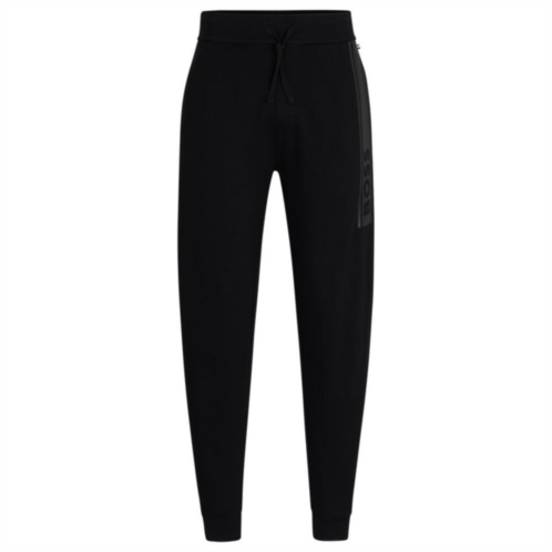 BOSS cuffed tracksuit bottoms in french terry with logo print