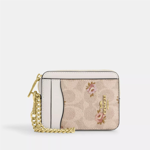 Coach Outlet zip card case in signature canvas with floral print
