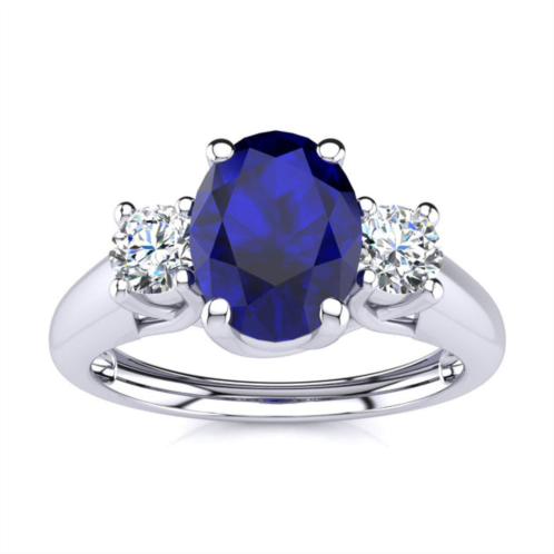 SSELECTS 1 1/5 carat oval shape sapphire and two diamond ring in 14 karat white gold