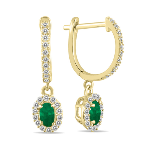 SSELECTS 1/2 carat oval emerald and diamond halo dangle earrings in 10k yellow gold