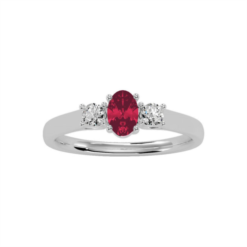 SSELECTS 3/4 carat oval shape ruby and two diamond ring in 14 karat white gold