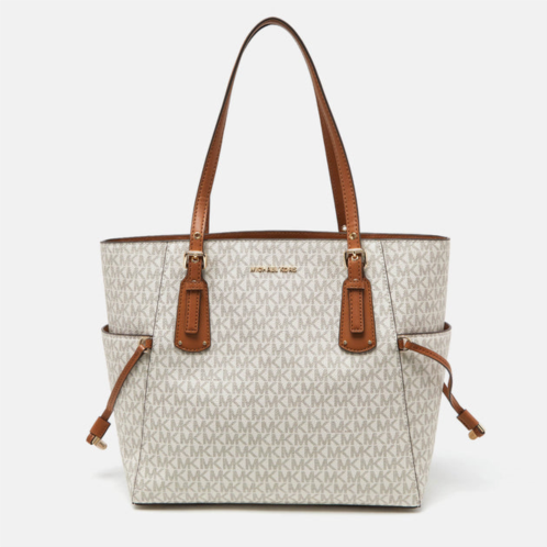 Michael Kors cream/tan signature coated canvas and leather voyager tote