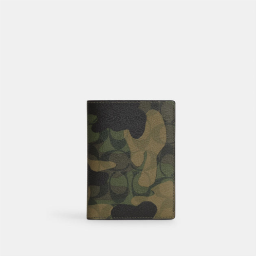 Coach Outlet passport case in signature canvas with camo print