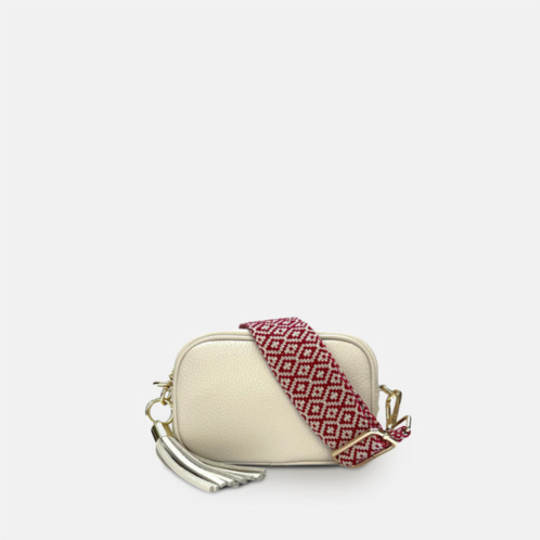 Apatchy London the mini tassel stone leather phone bag with red cross-stitch strap