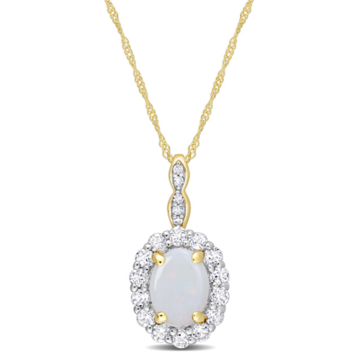 Mimi & Max 1 1/2 ct tgw oval shape opal and white topaz and diamond accent halo pendant with chain in 14k yellow gold