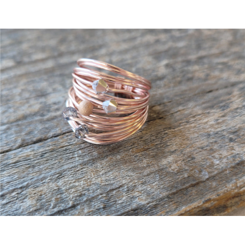 A Blonde and Her Bag marcia wire wrap ring in rose gold with grey comet swarovski crystals