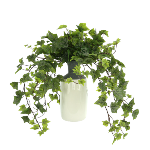 Creative Displays ivy arrangement in a tall ceramic vase