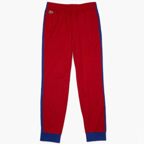 LACOSTE mens sport pique jogging pant in red/blue
