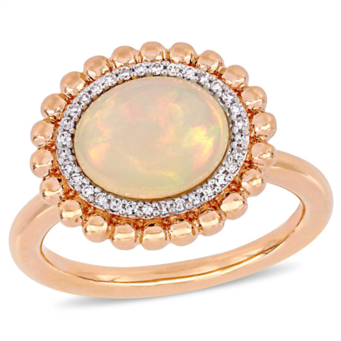 Mimi & Max 2 3/4 ct tgw oval-cut ethiopian blue-hued opal and 1/10 ct tw diamond halo ring in 14k rose gold
