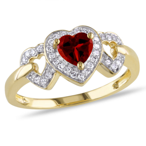 Mimi & Max garnet triple heart ring with 1/8 ct tw diamonds in 10k yellow gold