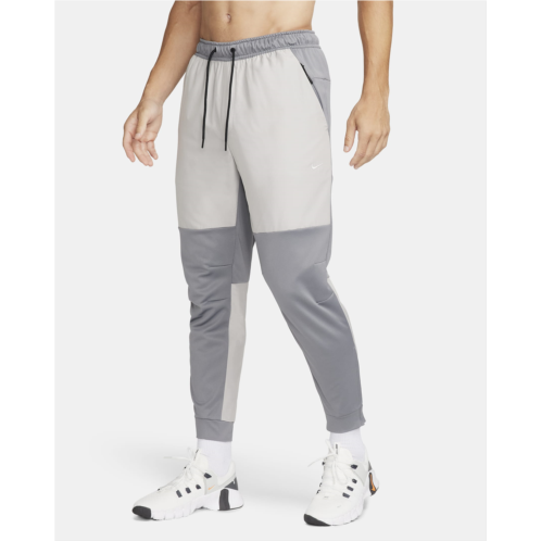 Nike Unlimited Mens Water-Repellent Zippered Cuff Versatile Pants