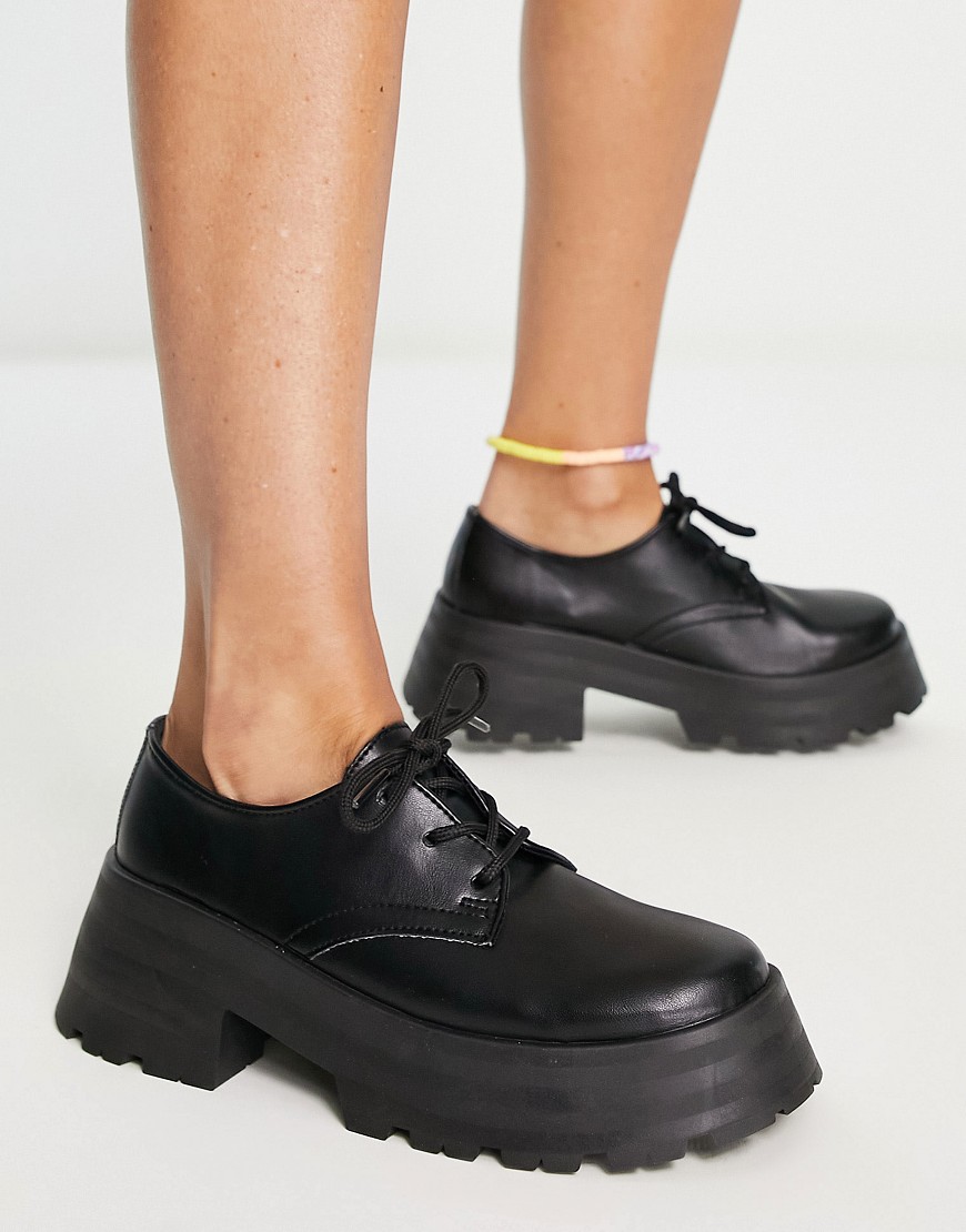 ASOS DESIGN Monday chunky lace up flat shoes in black