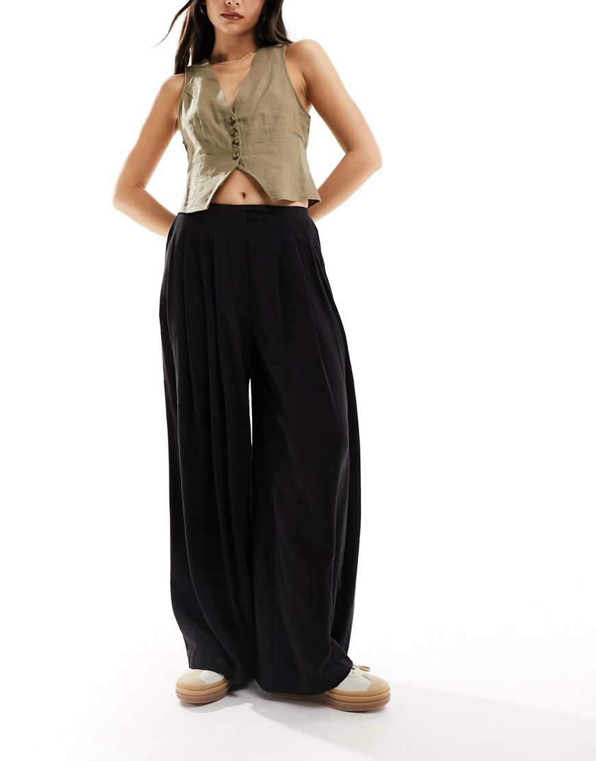 ASOS DESIGN pleated palazzo wide leg pants with linen in black