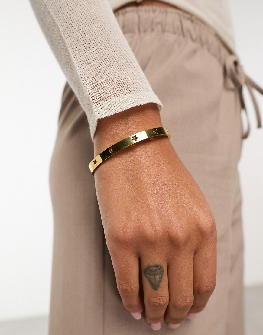 ASOS DESIGN waterproof stainless steel bangle with celestial design
