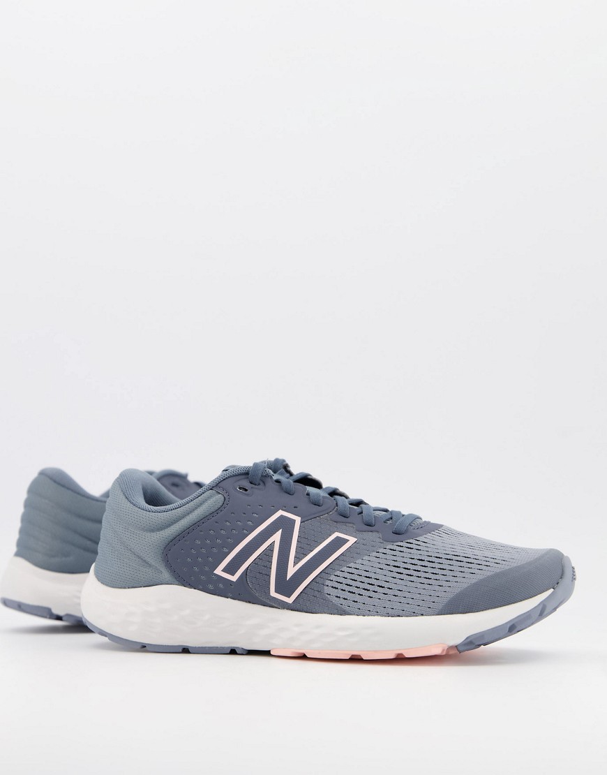 New Balance 520 sneakers in navy blue and pink