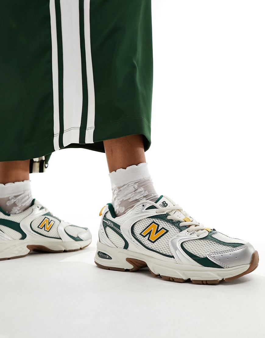 New Balance 530 collegiate sneakers in white green and gold Exclusive at ASOS