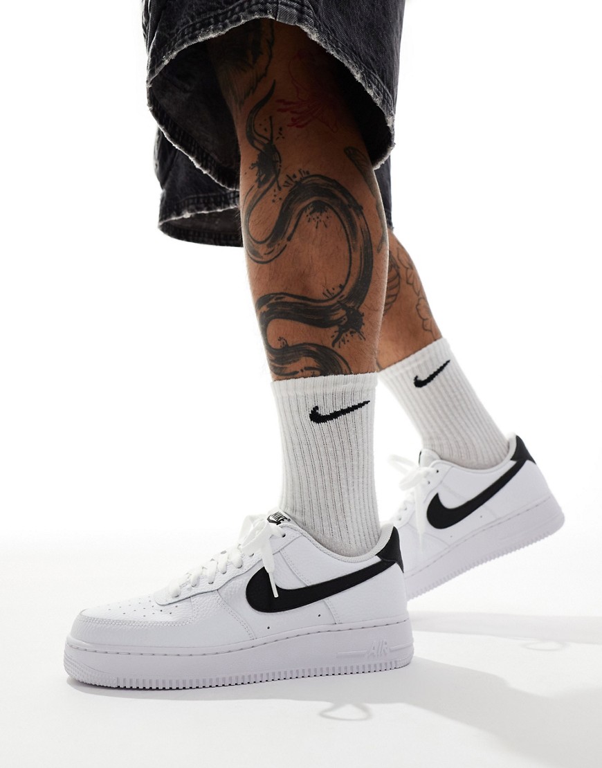 Nike Air Force 1 07 sneakers in white and black