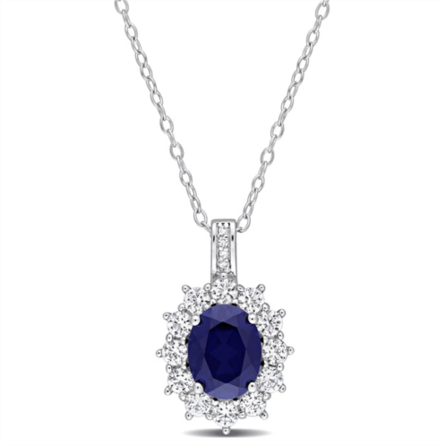 Mimi & Max 4 ct tgw created blue and created white sapphire and 0.02 ct tw diamond oval halo pendant with chain in sterling silver