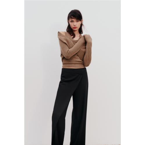 Zara Pants with a high front wrap waist and snap button. Wide leg. Side hidden in-seam zip closure.