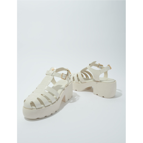 Maje Leather sandals with tread