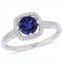 Amour 1 CT TGW Created Blue Sapphire and 1/7 CT TW Diamond Halo Ring In 10K White Gold