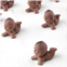 Factory Direct Craft Pack of 24 Kewpie Babies - Brown Babies for Baby Shower Favors, Cake Decorations, Gender Reveals, and Baby Gift Decorations (Size: 1-1/2 L x 1-1/4 H)