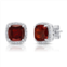 MAXCOLOR 7mm cushion cut garnet and diamond accent halo stud earrings in sterling silver