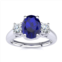 SSELECTS 1 1/5 carat oval shape sapphire and two diamond ring in 14 karat white gold