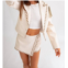 LE LIS royce faux leather fringe & stud cropped jacket in cream