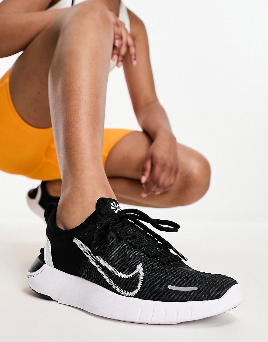 Nike Running Nike Free Run Flyknit sneakers in black & white