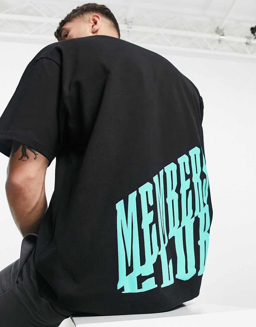 The Couture Club oversized t-shirt in black with neon green placement print