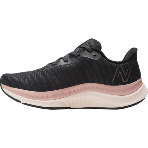 New Balance womens fuelcell propel v4 running shoe - medium width in black/quartz pink/pink moon