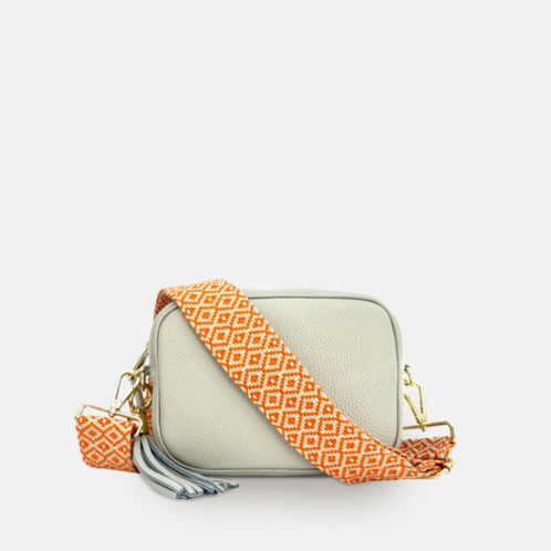 Apatchy London light grey leather crossbody bag with orange cross-stitch strap