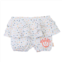 Sophie la Girafe white polka ruffle logo shorts