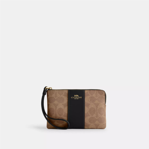 Coach Outlet corner zip wristlet in signature canvas with stripe