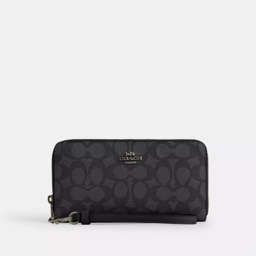 Coach Outlet long zip around wallet in signature canvas