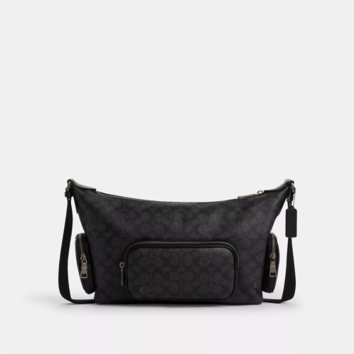 Coach Outlet finn crossbody bag with pockets in signature canvas