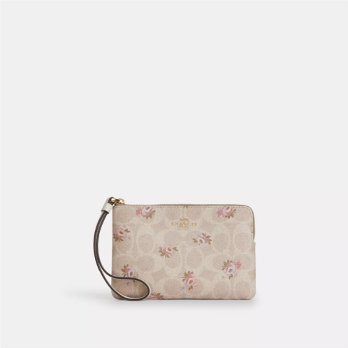 Coach Outlet corner zip wristlet in signature canvas with floral print