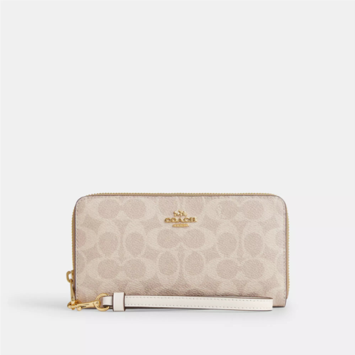 Coach Outlet long zip around wallet in signature canvas