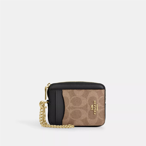 Coach Outlet zip card case in signature canvas