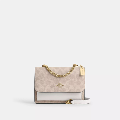 Coach Outlet mini klare crossbody bag in signature canvas