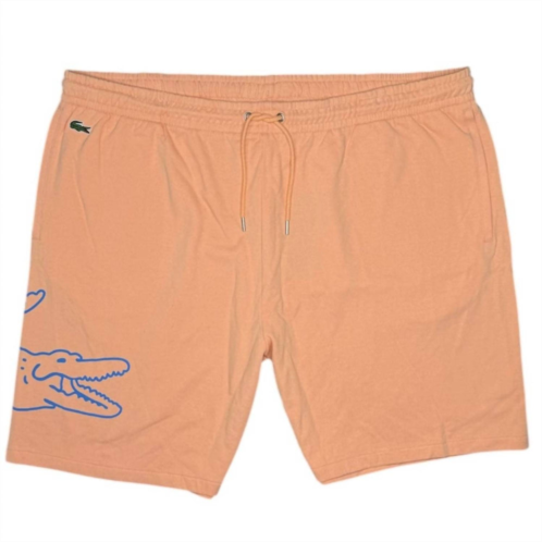 LACOSTE crocodile print fleece short in light orange